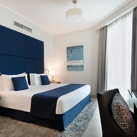 Centara West Bay Hotel & Residences Doha Exteriör bild Deluxe room