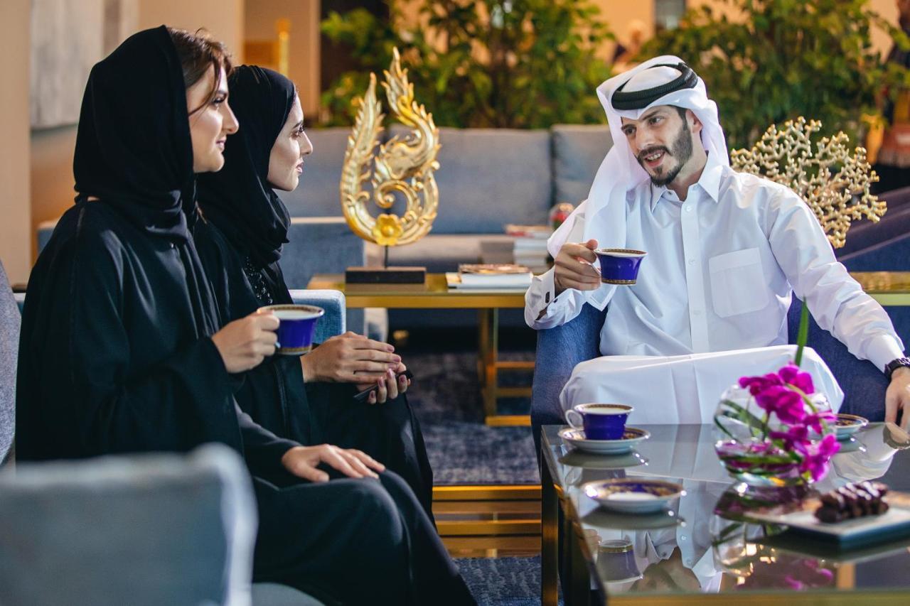 Centara West Bay Hotel & Residences Doha Exteriör bild Arab people drinking Arabic coffee