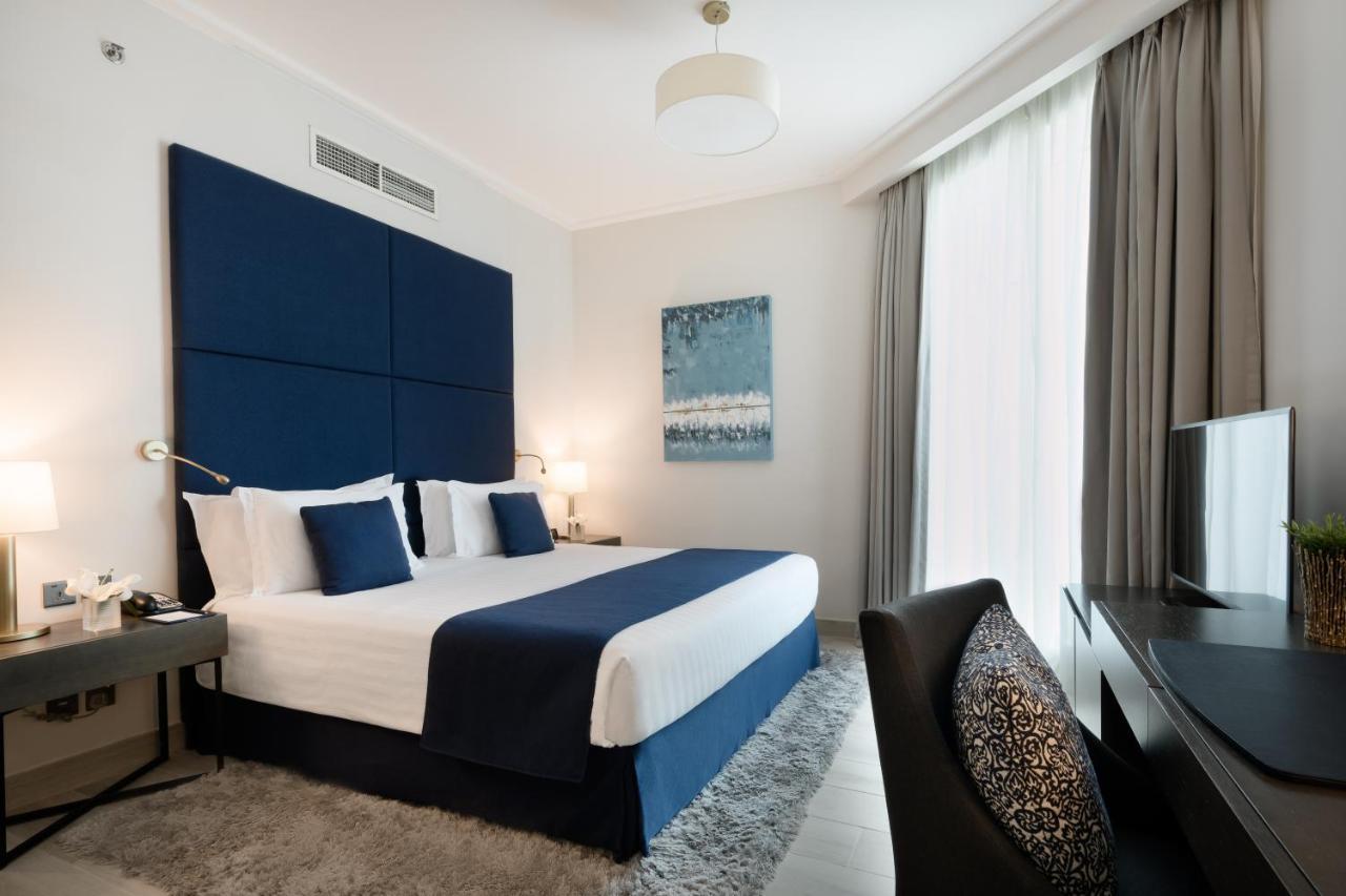 Centara West Bay Hotel & Residences Doha Exteriör bild Deluxe room