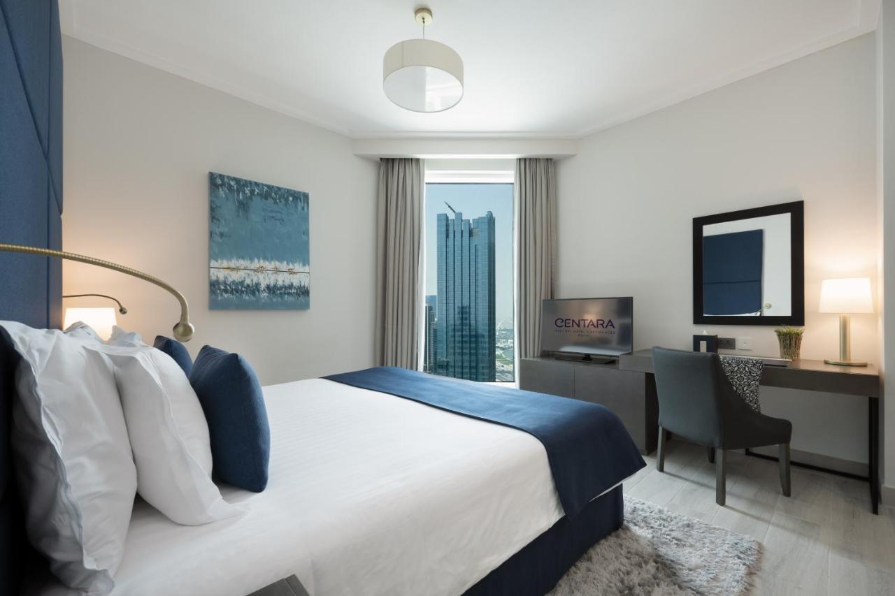 Centara West Bay Hotel & Residences Doha Exteriör bild A bedroom at the hotel