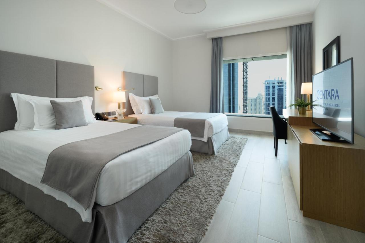 Centara West Bay Hotel & Residences Doha Exteriör bild A room at the hotel
