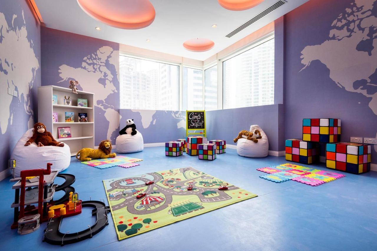 Centara West Bay Hotel & Residences Doha Exteriör bild The Children's Room